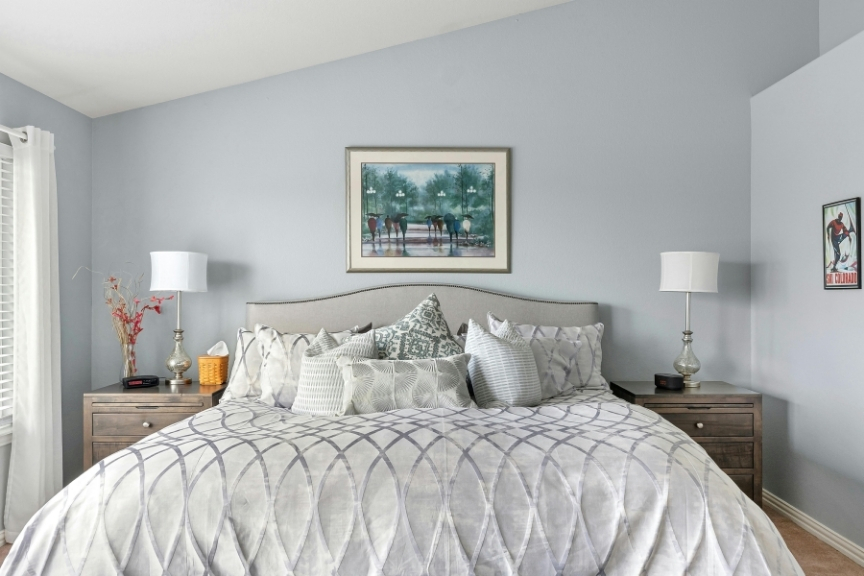 Finished bedroom with freshly painted blue-grey walls
